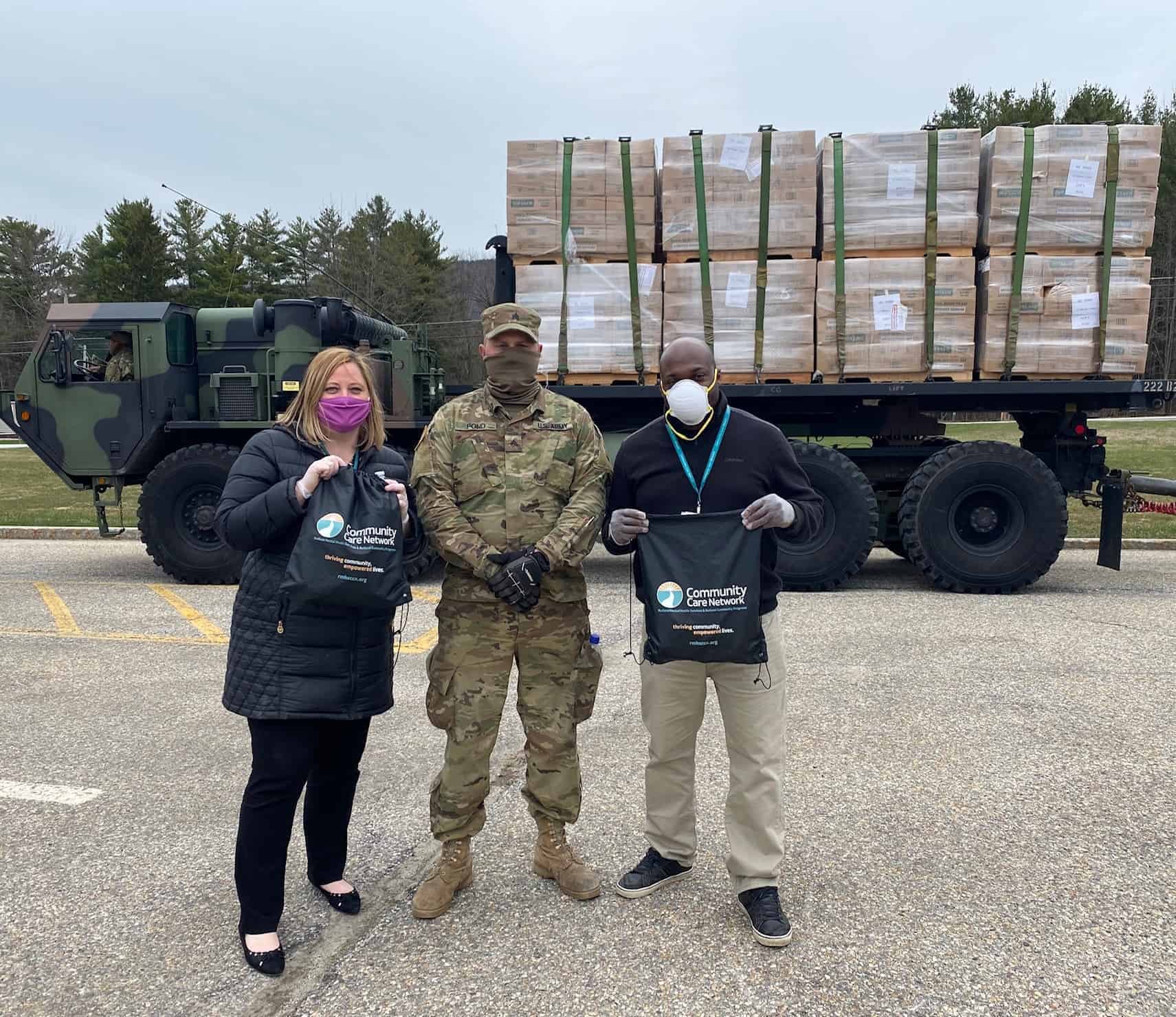 Community Care Network Crisis team works with the Vermont National Guard to provide community support during food distribution.